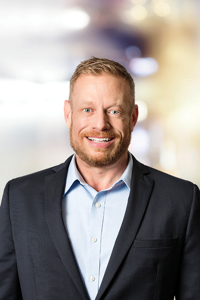 Portrait of Adam Linder, REALTOR®.